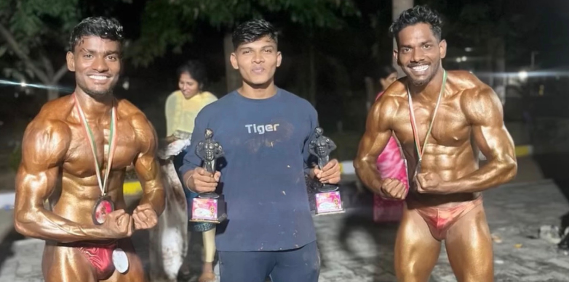 Jeya Surya with coached bodybuilding athletes after a competition