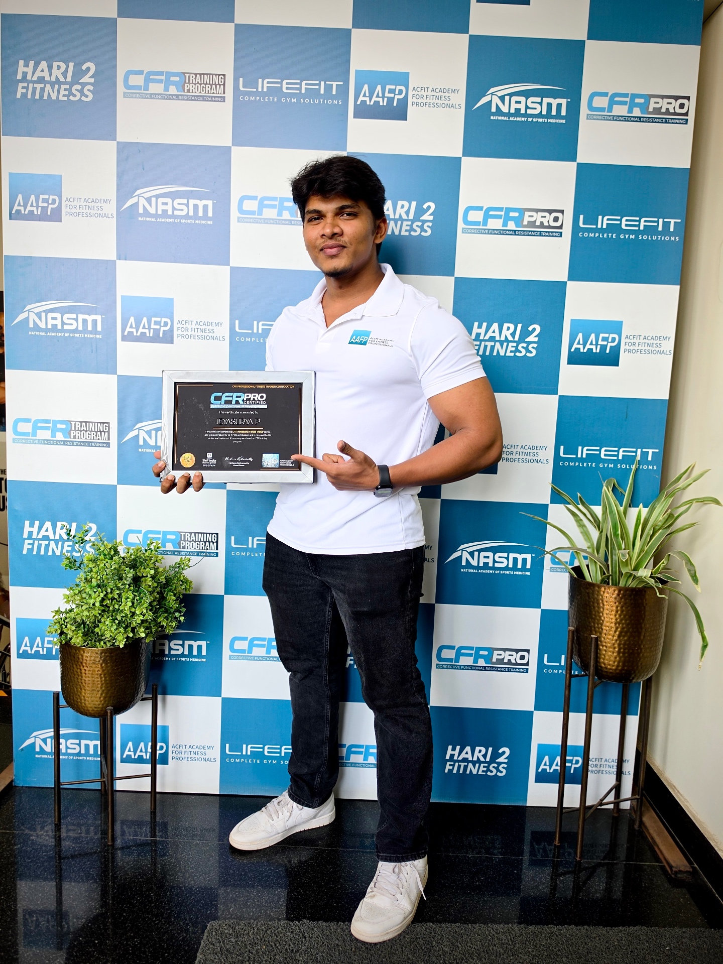 Jeya Surya receiving his CFR Pro certified fitness trainer certification